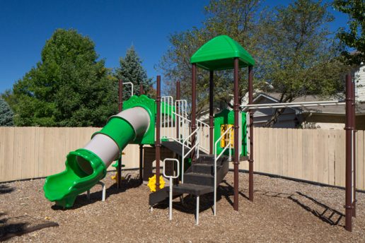 Playground with slide, monkey bars